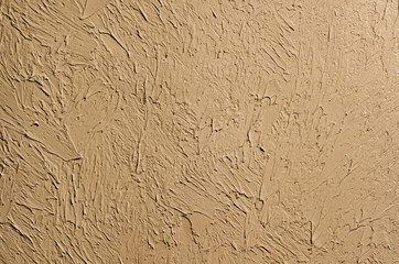 Wallpaper texture of frozen clay on the wall. Contrast chiaroscuro background
