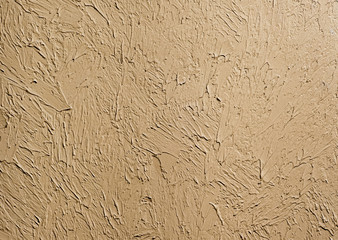 Wallpaper texture of frozen clay on the wall. Contrast chiaroscuro background