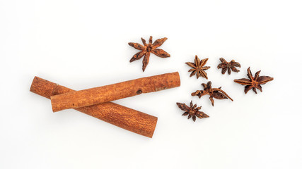 cinnamon and star anise on a white background.
