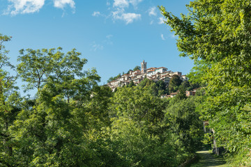 Naklejka premium Sacro Monte di Varese, picturesque medieval village in north Italy, located at the end of a Sacred way of 14 chapels, with the 8th and 9th chapel at the bottom right. World Heritage Site - Unesco