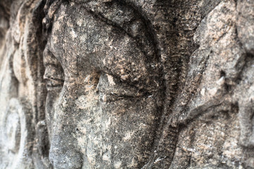Woman's face. Cemetery sculpture. Close-up.