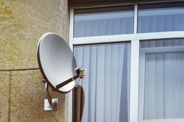 Satellite antenna on the facade