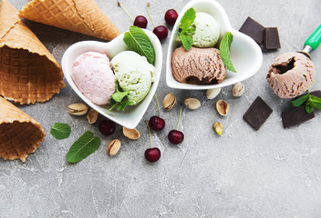 set of ice cream scoops of different colors and flavours