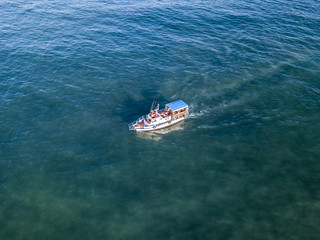 aerial ship in the sea going on the dirty polluted harmful water