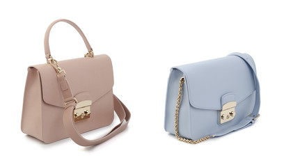 group of color leather women handbags isolated on white background