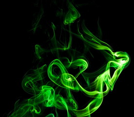 Green smoke on black background