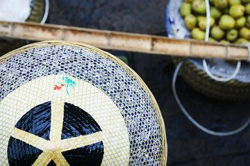 STREET SELLER ,SELLING FRUIT IN MARKET