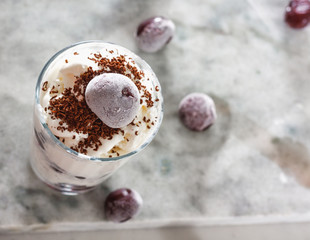 Ice cream with cherry berries on  beautiful marble countertop background