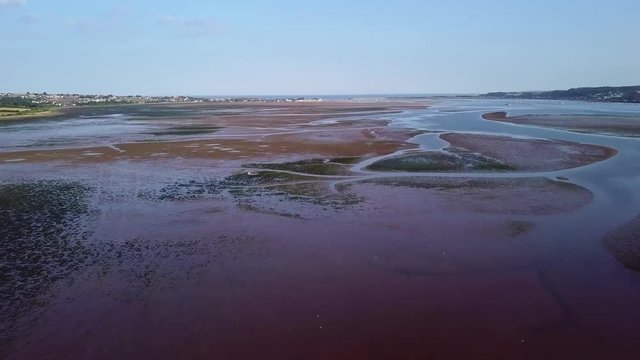 Aerial shot over Wetlands, near a River.