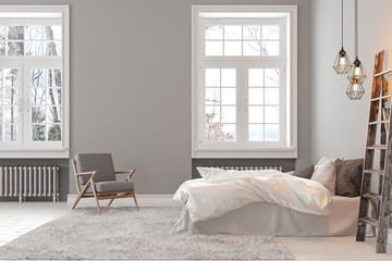 Scandinavin loft gray empty bedroom interior with armchair, bed and lamp. © YKvisual