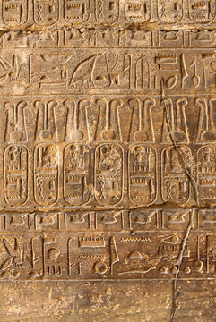 Ancient stone column with Egyptian hieroglyphs