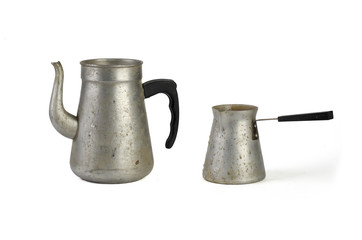 old metal teapot and cezve for turkish coffee isolated on white background