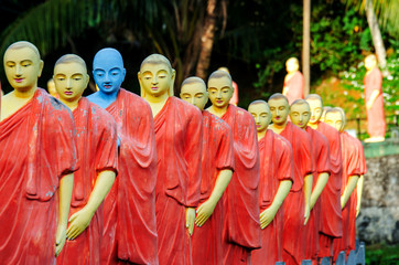 Statues of Buddhist monks in one of the temples of Sri Lanka.
