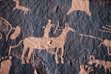 Hunter petroglyph on Newspaper Rock in Canyonlands National Park, Southwest USA