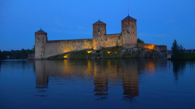 View of the towers of the fortress Olavinlinna. July evening. Savonlinna, Finland