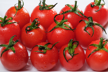 Fresh ripe cherry tomatoes or small tomatoes.