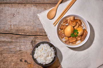 Braised three layer pork with seasoned boiled egg.