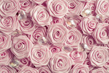 Satin ribbon pink roses pattern background