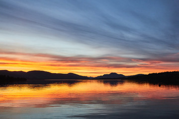 Colorful scenic sunset view of Loch lomond lake in Scotland, United Kingdom.