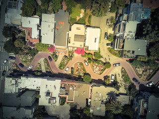 Vintage tone aerial Lombard Street, an east–west street in San Francisco, California. Famous for...