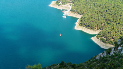 Boat sailing in Sahinkaya Canyon in Vezirkopru lake of Samsun province,Turkey.