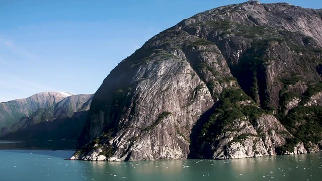 The Rock is a well known feature of Tracy Arm Fjord near Juneau, Alaska. Untamed, natural wilderness and wildlife with incredible landscape. Slow motion.
