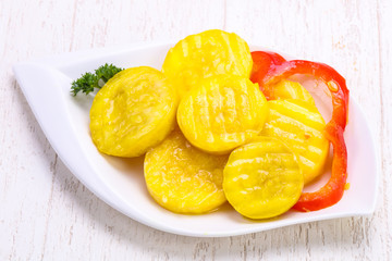 Pickled zucchini in the bowl