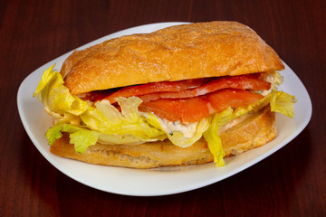 Salmon sandwich with salad