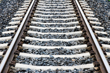 Detail of railroad tracks. Focus on foreground.