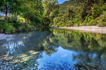 Fototapeta na wymiar Natisone river at Biarzo, a small village close to Cividale del Friuli, Udine province, Friuli Venezia Giulia region, Italy.
