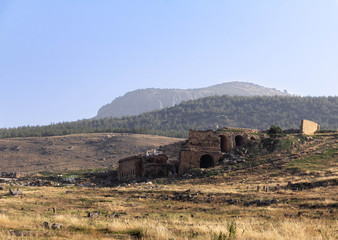 Ruins of an ancient city against the blue sky