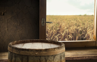 beer with wheat background on wooden table