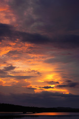 Dramatic sky at sunset after severe thunderstorm.