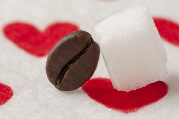coffe bean and sugar cube in a Lovely hug