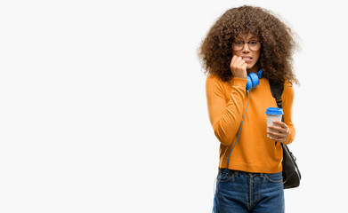 African american student woman terrified and nervous expressing anxiety and panic gesture, overwhelmed