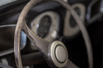 Old worn driving wheel of a car