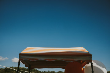 Blue sky with orange tent