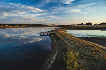 Obraz premium A small bridge in a lake