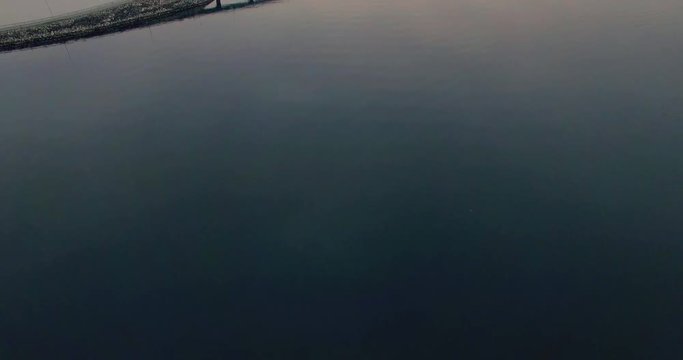 4K Drone footage of bridge between two Islands in Norway. Tilt up on bridge in Stavanger with name askjesundbrua.