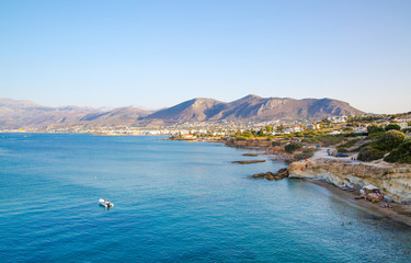 Fototapeta premium Crete, Greece. Hersonessos aria view on the town, mountains and sea