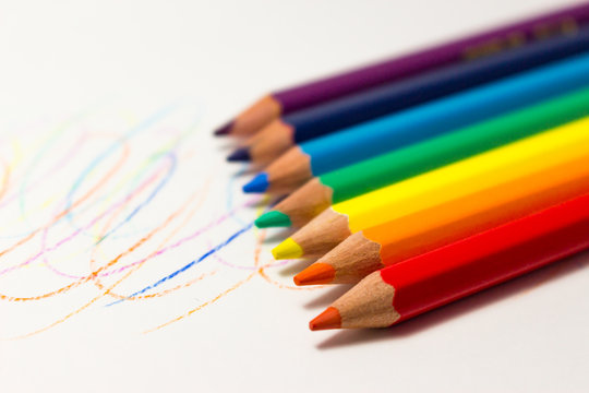 Color pencils on white background, rainbow colors