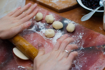 hand cooking dumplings