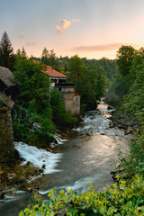 Fototapeta na wymiar Beautiful sunset at famous Rastoke waterfalls village in Slunj, Coratia.