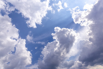 Naklejka na ściany i meble cloudscape with blue sky and shining sun