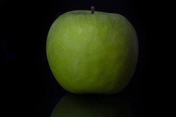 Apple on black background
