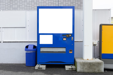 Empty white shelves of standard office vending machine