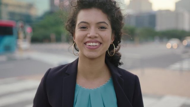 portrait of happy young business woman intern student smiling cheerful at camera enjoying lifestyle