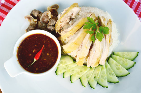 Hainanese chicken rice, steamed chicken and white rice (Thai name is Khao Man Kai)