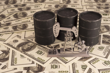 barrels with oil, neftechka, dollars. oil market. production, sale of petroleum products.