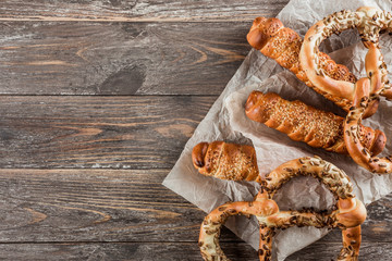 Pretzels and sausage dishes arranged on the table